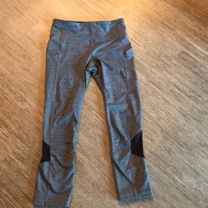 Grey lululemon leggings with black mesh detailing